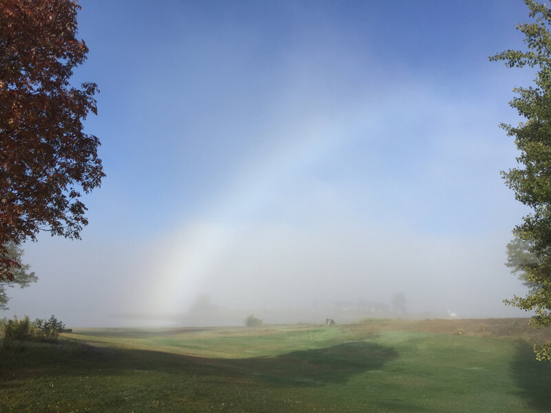The fogbow base shows a hint of color. Credit: Phil Plait