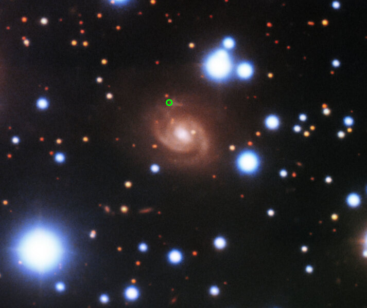 The 8.2-meter Gemini North telescope took this image of the location of the fast radio burst FRB 180916.J0158+65 (green circle), which is in a star-forming region of a spiral galaxy about 500 million light years from Earth. Credit: Gemini Observatory