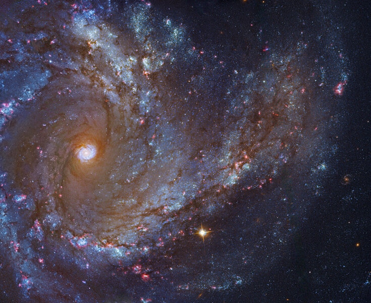 The gorgeous spiral galaxy M61, in a composite of images from Hubble, the VLT, and amateur observations. Credit: Robert Gendler, Roberto Colombari, Hubble Legacy Archive, European Southern Observatories