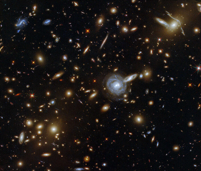 The galaxy cluster Abell S0295, a vast structure containing dozens if not hundreds of galaxies. Credit: SA/Hubble & NASA, F. Pacaud, D. Coe
