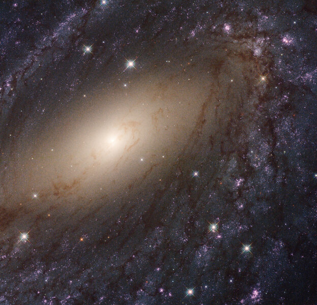 NGC 6744, a patchy spiral galaxy with lots of young, massive stars in it. Credit: NASA, ESA, and the LEGUS team