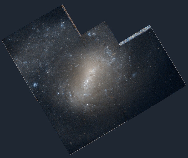 NGC 4618, a spiral galaxy interacting with NGC 4625. The odd shape of the image is due to the detector layout in the old Hubble WFPC2 camera. Credit: NASA/ESA Hubble Space Telescope, and obtained from the Hubble Legacy Archive / wikipedia
