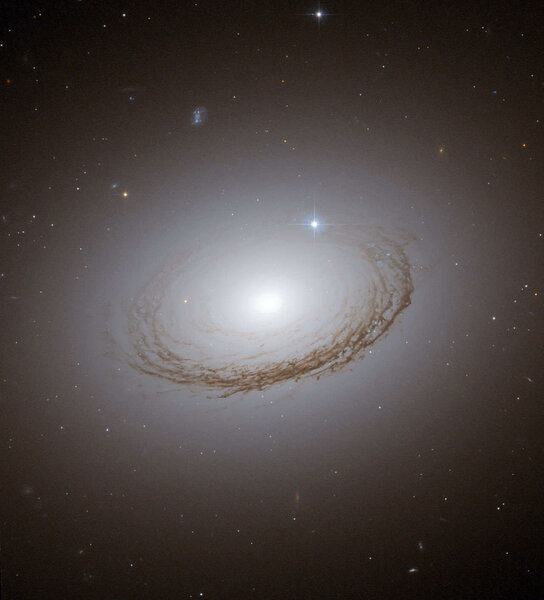 NGC 7049, a dusty spiral galaxy. Credit: NASA, ESA and W. Harris (McMaster University, Ontario, Canada)