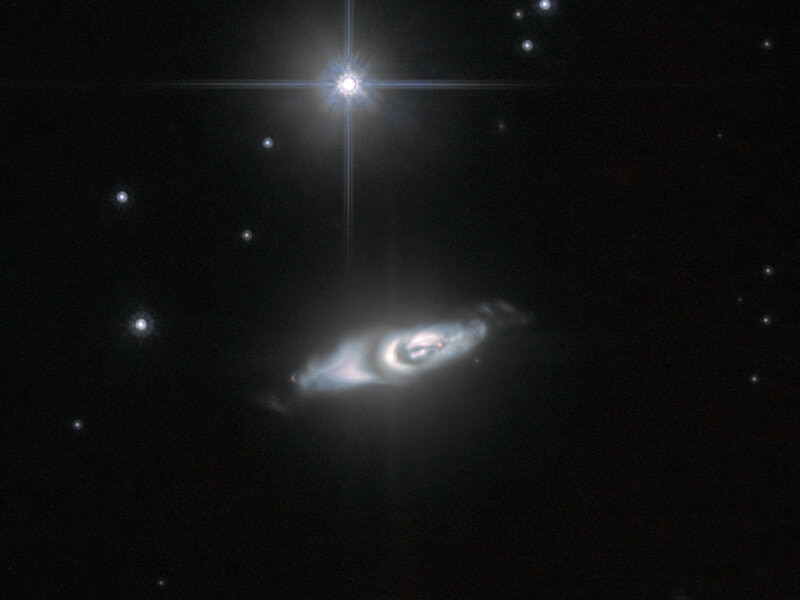 The protoplanetary nebula IRAS 22036+5306, a dying star about 6,500 light years away. Credit: ESA/Hubble &amp; NASA