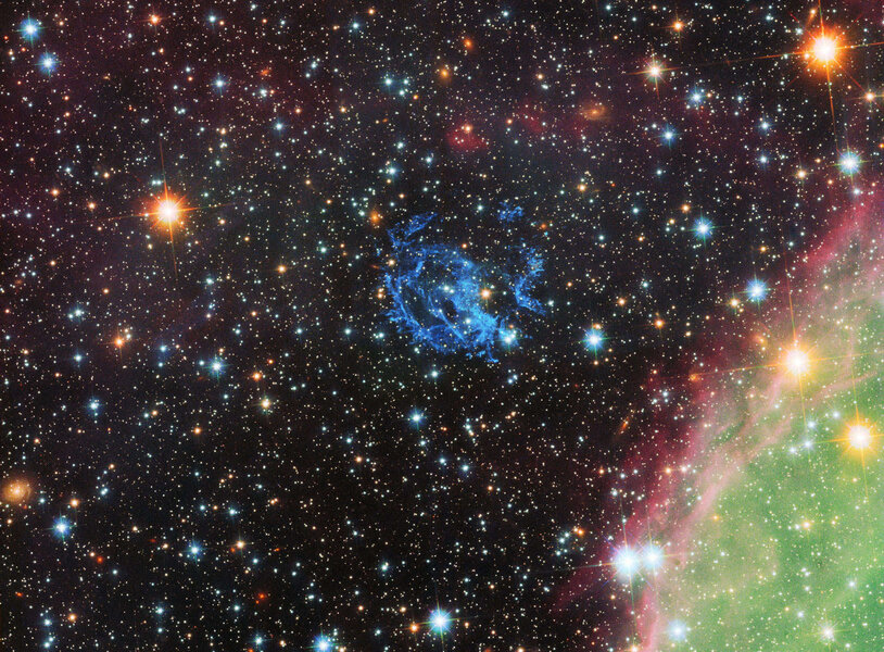 A Hubble Space Telescope image of the supernova remnant 1E 0102.2-7219 shows gaseous debris from the exploding star. To the bottom right as an enormous star-forming region called N76. Credit: NASA, ESA and the Hubble Heritage Team (STScI/AURA)
