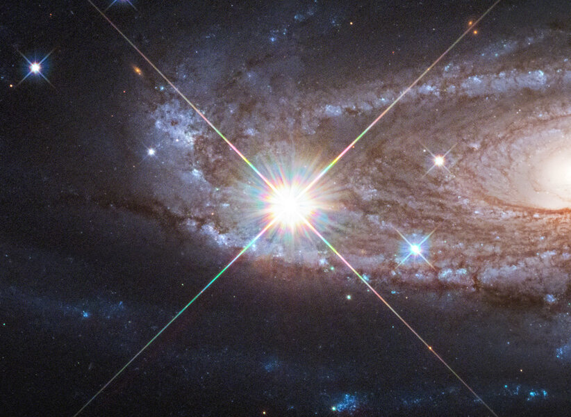Detail of the Hubble image of UGC 2885 shows a foreground star dominating the view. Credit: NASA, ESA, and B. Holwerda (University of Louisville)