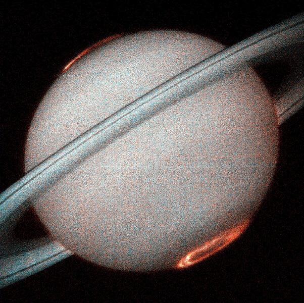 An image of Saturn in the far ultraviolet using STIS, a camera on Hubble, from 1998 shows the glow of its aurora due to hydrogen atoms zapped by the solar wind. Credit: J.T. Trauger (Jet Propulsion Laboratory) and NASA