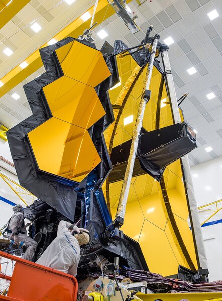 The James Webb Space Telescope’s primary mirror is composed of 18 smaller (1.3 meter) mirrors, which will unfold when the observatory reaches space. Credit: NASA / Chris Gunn