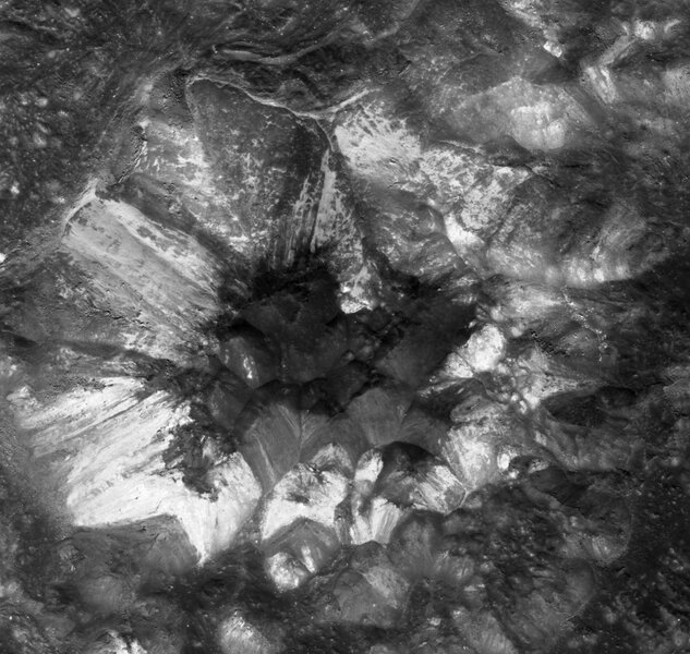 The very center of Jackson crater on the Moon is a jumbled mess of light and dark material. Credit: NASA/GSFC/Arizona State University