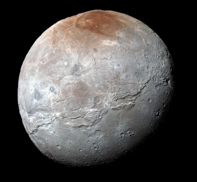 The jumbled mess that is Charon, Pluto’s large moon. Credit: NASA/JHUAPL/SwRI