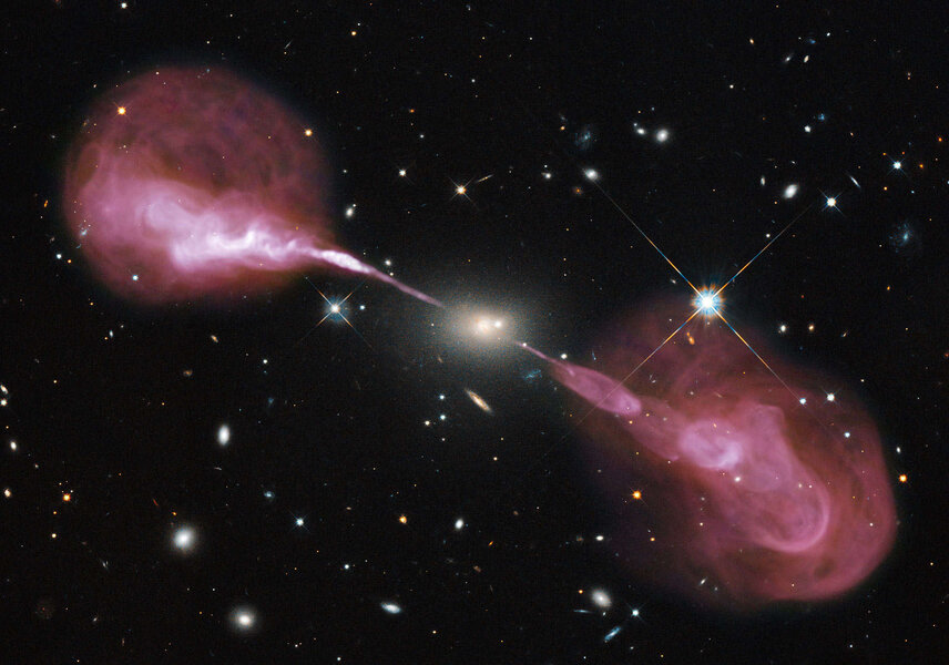 Hercules A is an example of a relatively nearby active galaxy, with a black hole in its heart eating matter and blasting out huge amounts of radiation and matter. Credit: NASA, ESA, S. Baum and C. O'Dea (RIT), R. Perley and W. Cotton (NRAO/AUI/NSF), and t