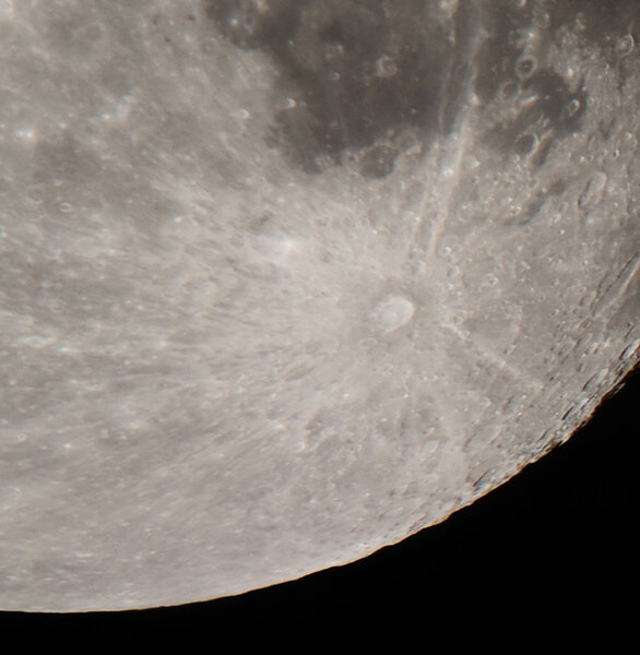 The huge lunar crater Tycho has a tremendous ray system reaching over a thousand kilometers, collapsed plumes from the impact that formed it. Credit: Phil Plait