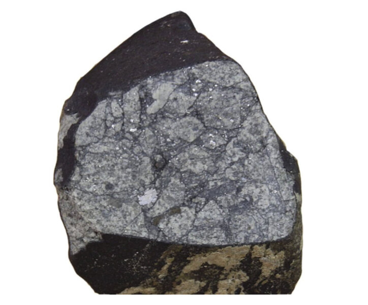 The brecciated structure is apparent after a part of the San Marco meteorite was sawed off. Credit: Demarco et al.