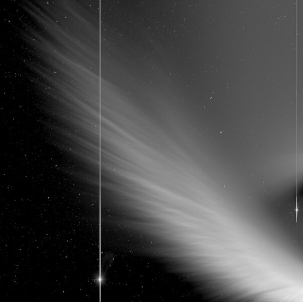 NASA’S STEREO spacecraft watched as Comet McNaught passed in 2007, when it displayed magnificent striae, long linear features showing dust affected by the Sun. You can see Venus (lower left) and Mercury (lower right). Credit: STEREO/NASA