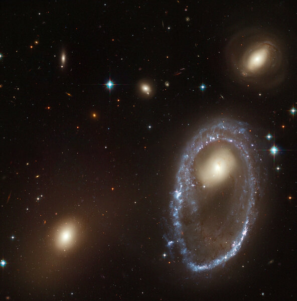 The ring galaxy AM 0644-071, created when a small compact galaxy plowed through the middle of a spiral galaxy at least tens of millions of years ago. Credit: NASA, ESA, and The Hubble Heritage Team (AURA/STScI)