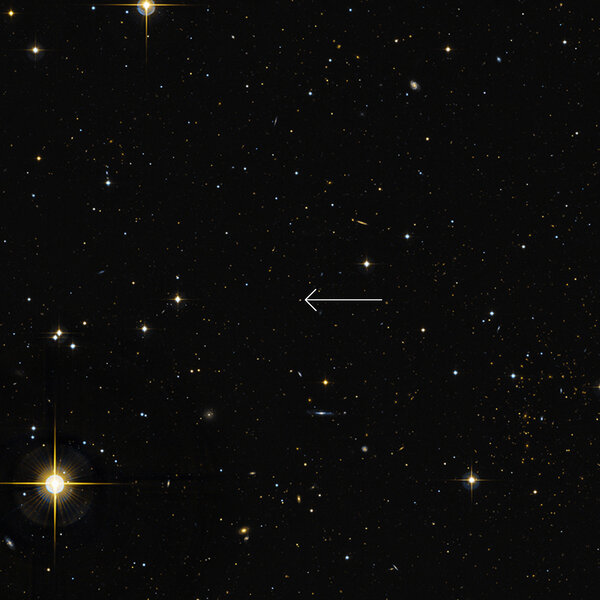An optical image showing the location of the galaxy 3XMM J150052.0+015452, where a black hole has been eating a star for more than a decade. Credit: CFHT