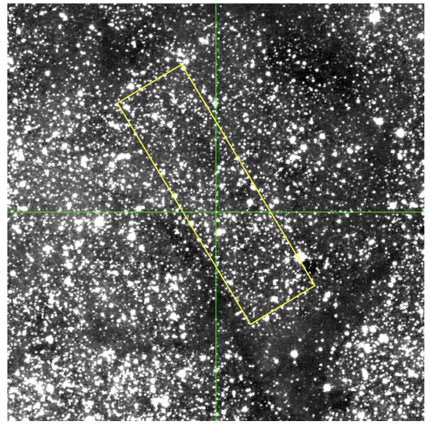 The field of stars around the microlensed star that led to the discovery of UKIRT-2017-BLG-001. The lensed star is in the center of the green crosshairs, and the yellow box contains stars used to determine the extinction toward the star.