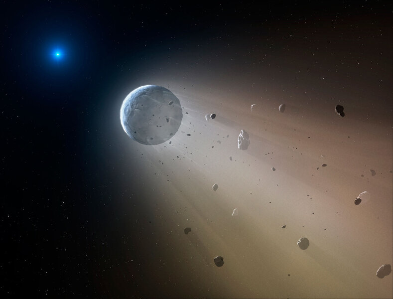 A white dwarf star erodes away at asteroids left over from when it was a more normal star like the Sun. Credit: Mark A. Garlick / markgarlick.com