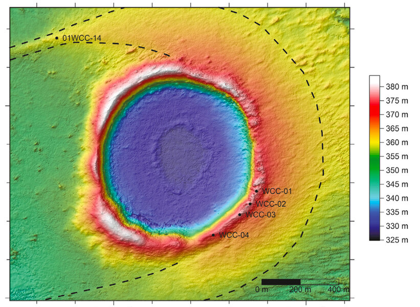 A topographical map of Wolfe Creek crater. The interior floor is quite flat, indicating it was filled in. The wind blows to the west, and a crescent-shaped dune has formed around it. Credit: Barrows et al.
