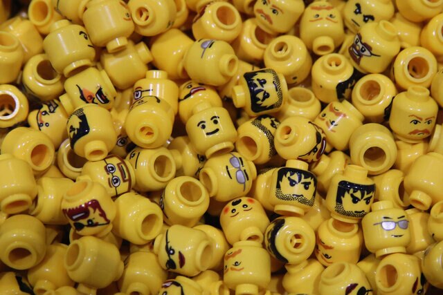 An assortment of LEGO minifigure heads