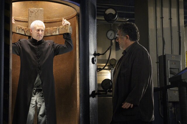 (l-r) Bret Spiner as Brother Adrian, Saul Rubinek as Artie Nelson in Warehouse 13.