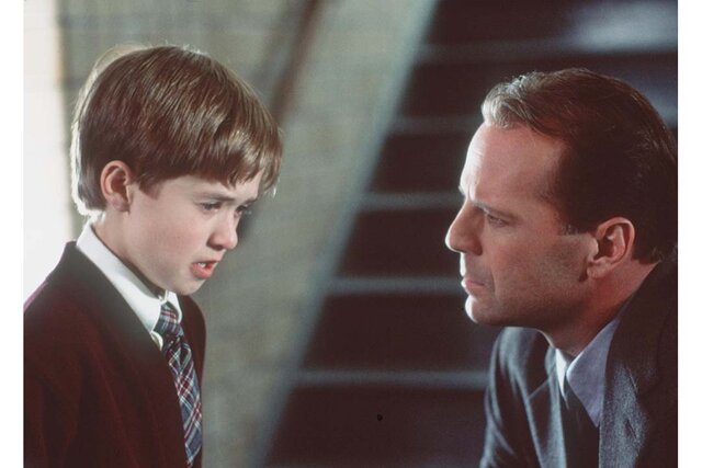 Bruce Willis and Haley Joel Osment in The Sixth Sense (1999)
