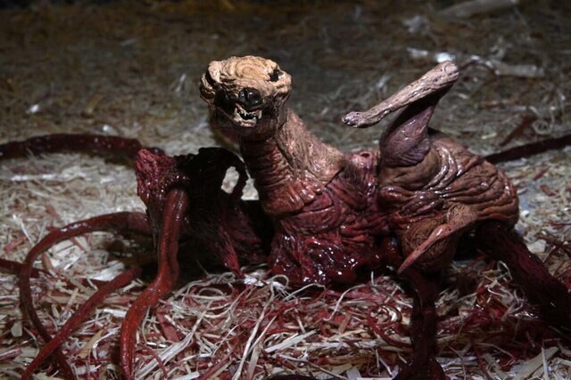A photo of The Thing Ultimate Dog creature action figure