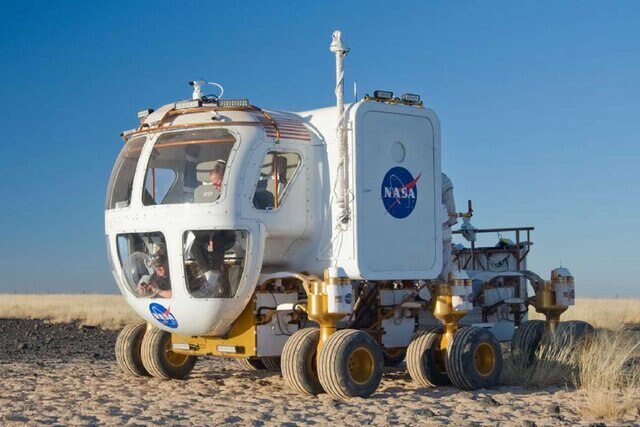 An image of a lunar electric rover on sand