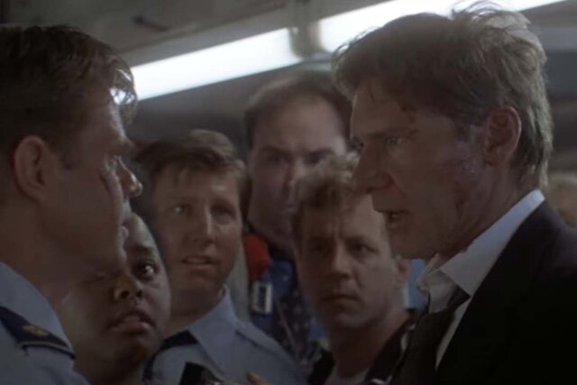 Harrison Ford as President James Marshall speaks to crew in Air Force One (1997)