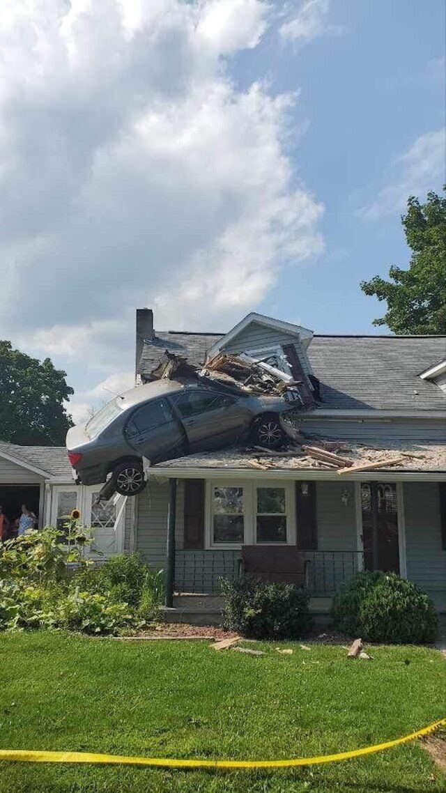 Exterior view of the second-story house car crash
