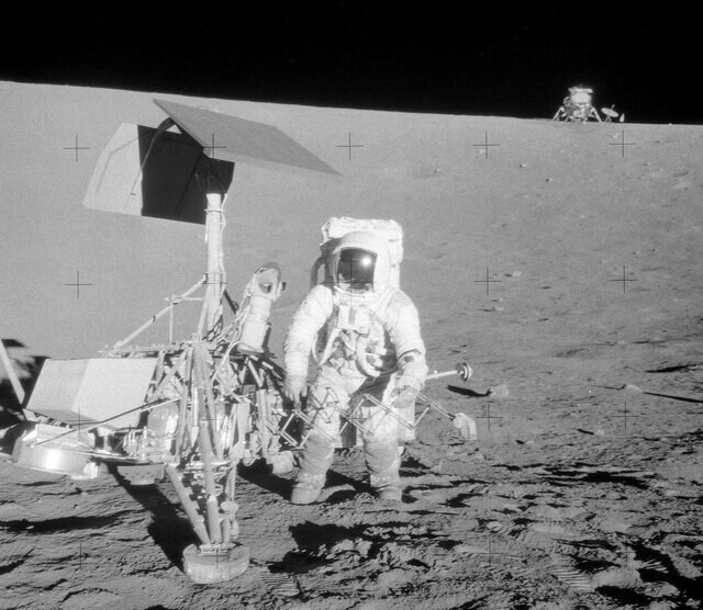 In November 1969, Apollo 12 landed near Surveyor 3, which had successfully landed on the Moon two years earlier. This shot shows Al Bean next to the lander. They were able to remove pieces of the probe to return to Earth for examination. Credit: NASA