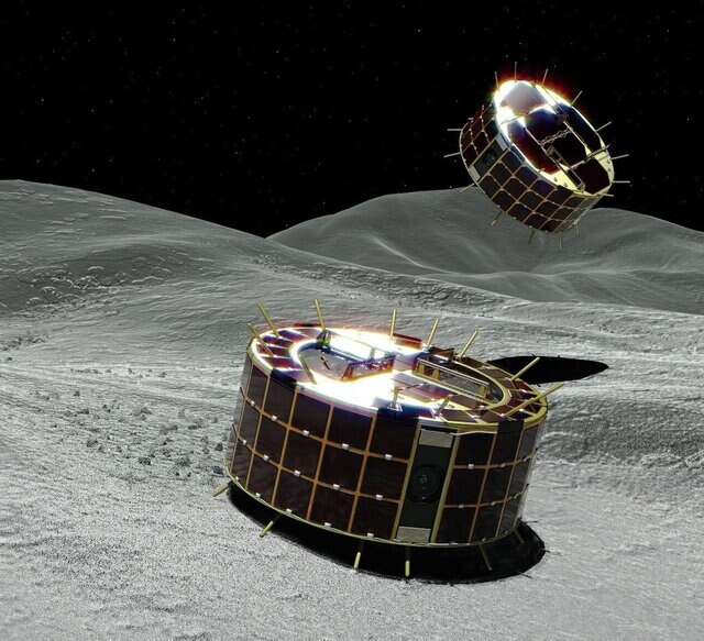 Artwork depicting the two MINERVAII-1 rovers on the surface of the asteroid Ryugu; they move by literally hopping. Credit: JAXA 