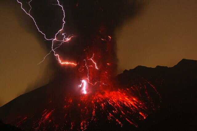 An eruption of Japan’s Sakarujima volcano creates bolts of lightning due to grains of ash rubbing against each other and building up an electric charge. Credit: Getty Images / Mike Lyvers