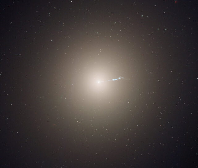  The elliptical galaxy M87 has a supermassive black hole in its heart (far too small to be seen in this Hubble image). 