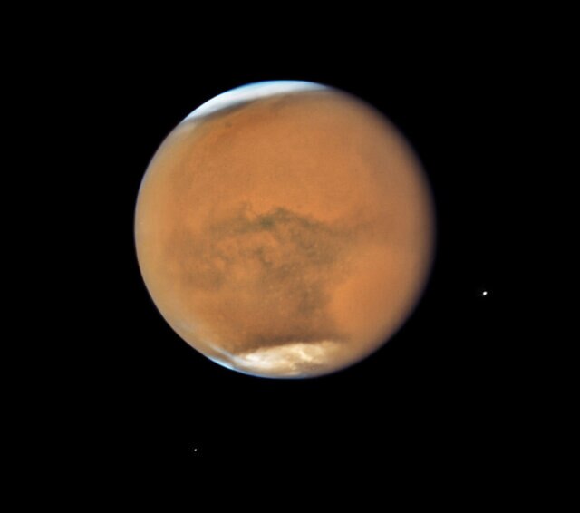 Mars, still obscured by a global dust storm, seen by Hubble on July 18, 2018. Credit: NASA, ESA, and STScI