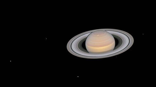Saturn and its moons, observed by Hubble on June 6, 2018. Credit: NASA, ESA, A. Simon (GSFC) and the OPAL Team, and J. DePasquale (STScI)