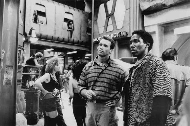 Mel Johnson Jr. and Arnold Schwarzenegger in Total Recall