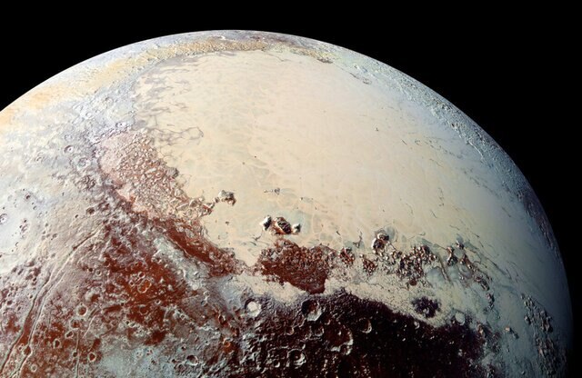 Color image of Sputnik Planum, the western lobe of Pluto's "heart", showing that it's smooth and craterless, implying some process has repaved it. Credit: NASA/Johns Hopkins University Applied Physics Laboratory/Southwest Research Institute