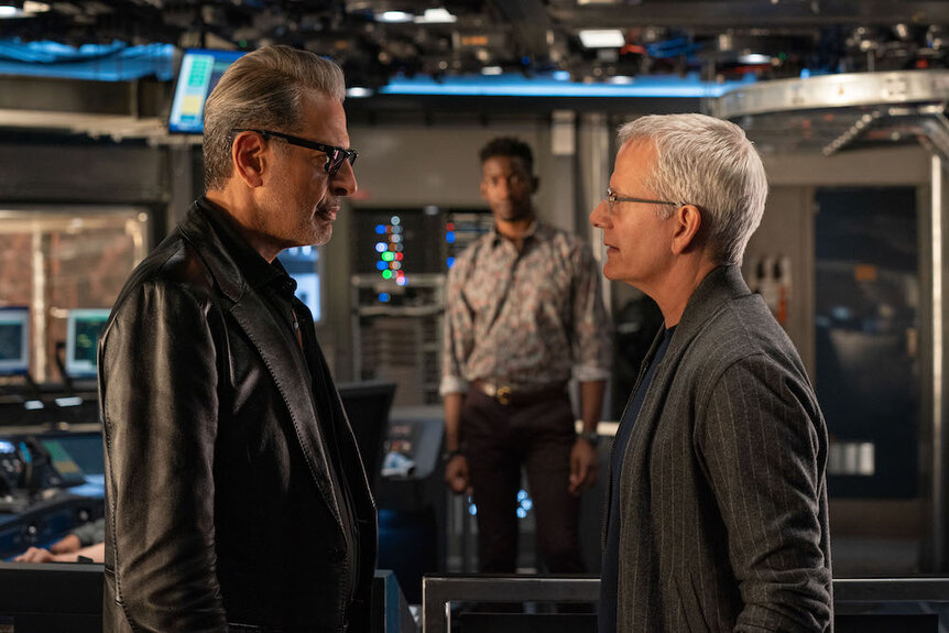 (from left) Dr. Ian Malcolm (Jeff Goldblum), Ramsay Cole (Mamoudou Athie) and Lewis Dodgson (Campbell Scott) in Jurassic World Dominion.