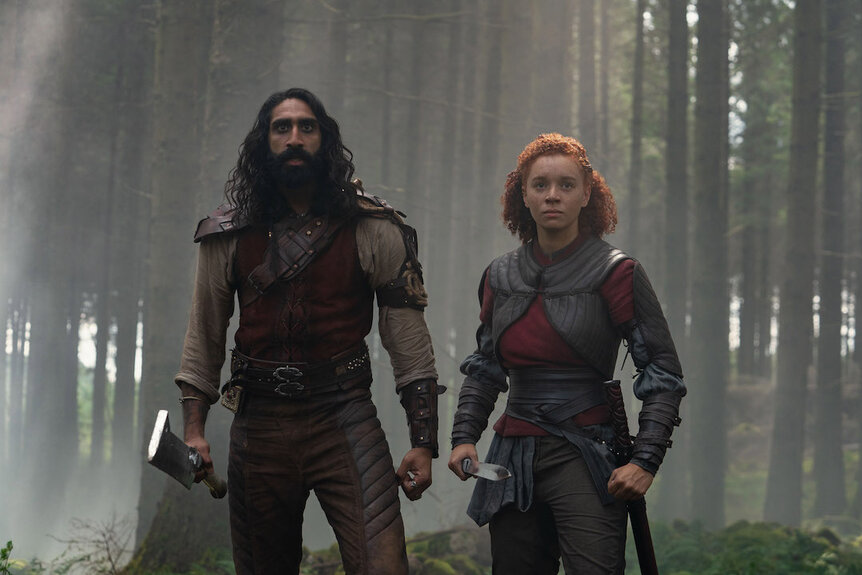 (L-R): Boorman (Amar Chadha-Patel) and Jade (Erin Kellyman) in Lucasfilm's WILLOW exclusively on Disney+.