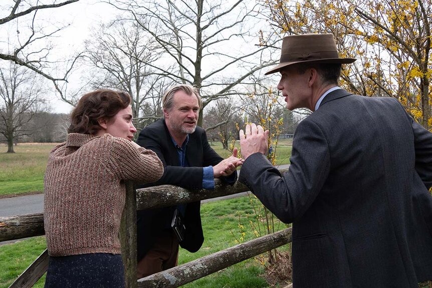 Emily Blunt and Cillian Murphy discuss with Christopher Nolan in Oppenheimer (2023)