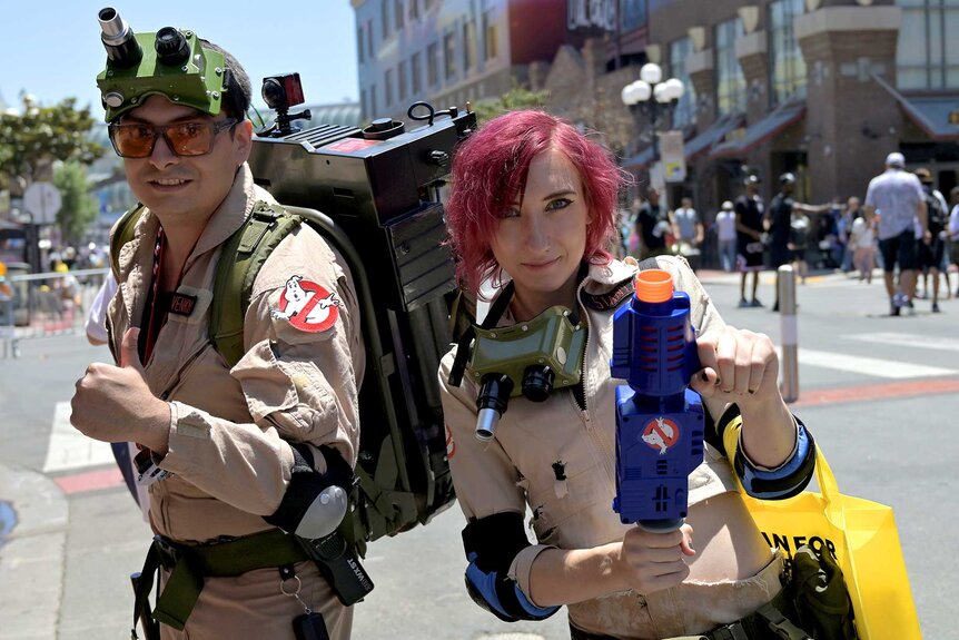 Fans dressed as the Ghostbusters at SDCC 2023