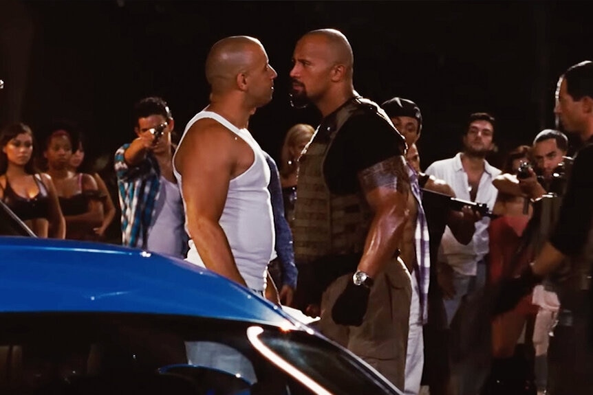 Vin Diesel and Dwayne "The Rock" Johnson confront each other in Fast Five (2011)