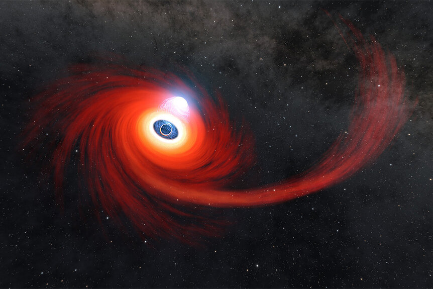A black hole destroying a star.