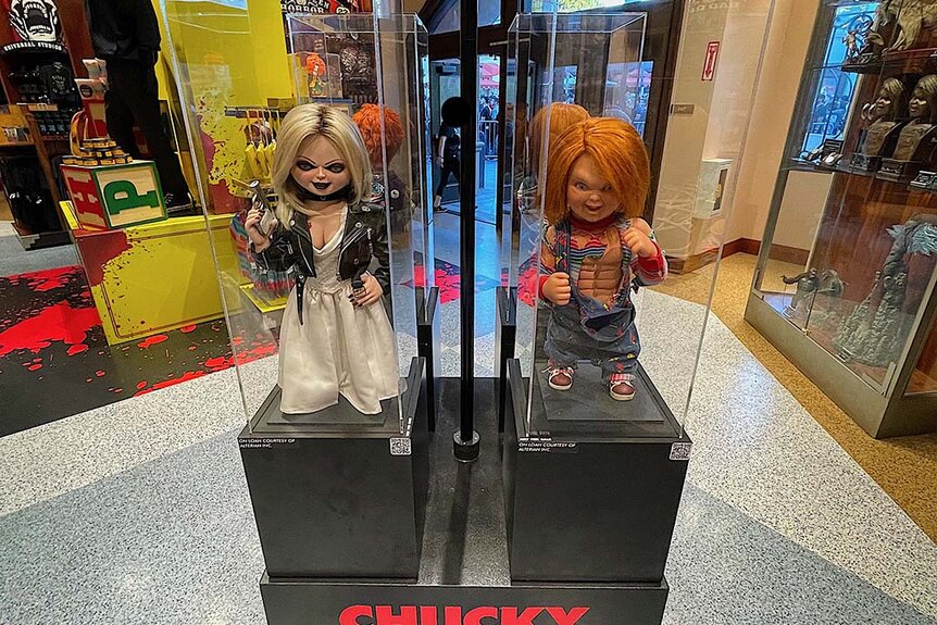 Tiffany and Chucky doll displays at the Chucky activation at Halloween Horror Nights 2023 at Universal Studios Hollywood.