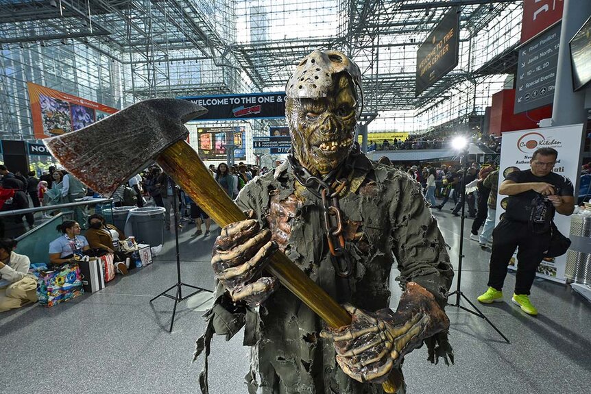 A cosplayer poses as Jason Vorhees during New York Comic Con 2023 - Day 4 at Javits Center.