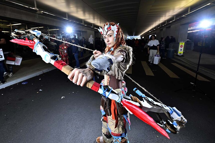 A cosplayer poses as Aloy from Horizon Zero Dawn during New York Comic Con 2023 - Day 4 at Javits Center.