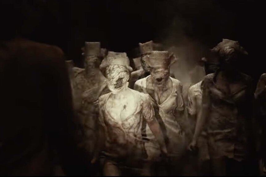 A troupe of faceless beige Nurse creatures appears in Silent Hill (2006).