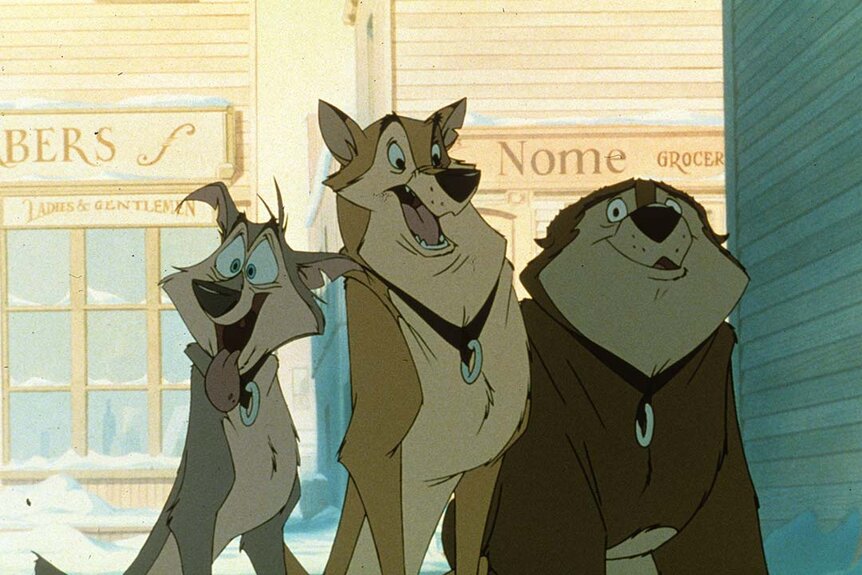 Three dogs smile together in Balto (1995).