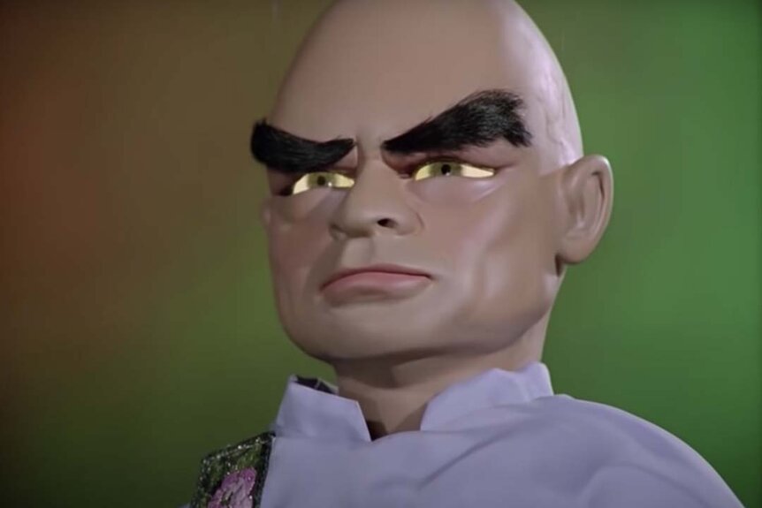 A puppet with thick eyebrows' eyes grow red in Thunderbirds (1965)
